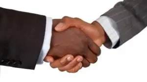 Closeup shot of two people shaking hands